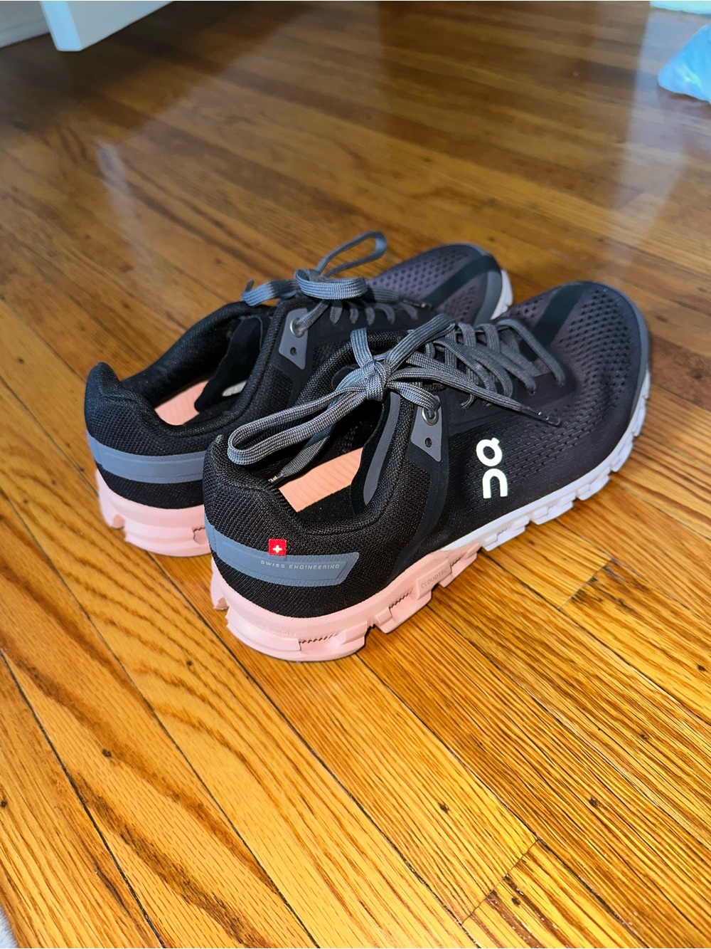On Running women's black and pink Cloud running shoes